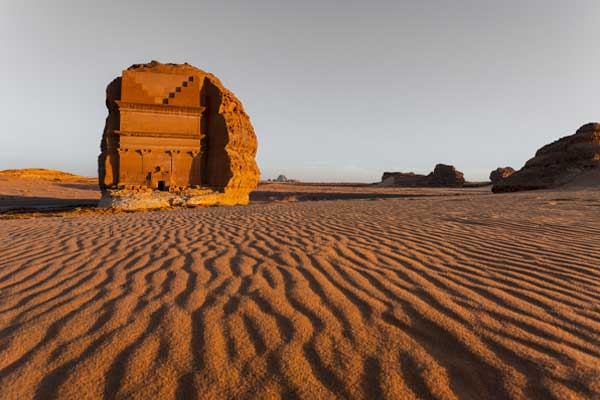 Ancient rock tombs carved into cliffs at Al Ula archaeological site